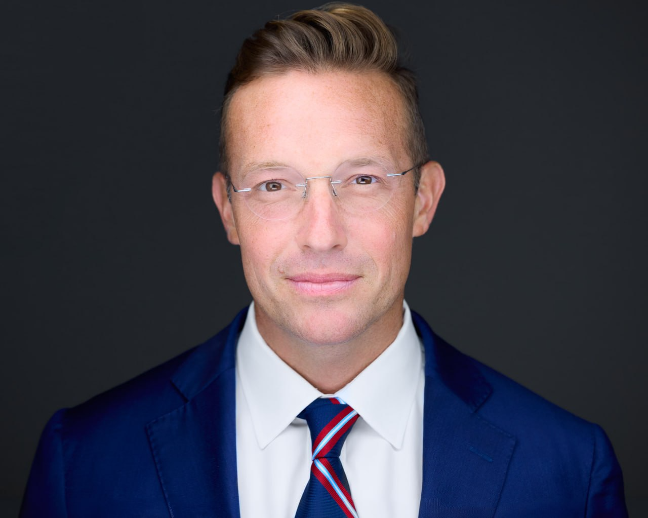 Portrait of featured speaker Benny Johnson